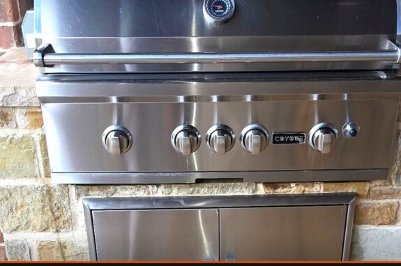 Coyote built-in outdoor gas grill after professional deep cleaning