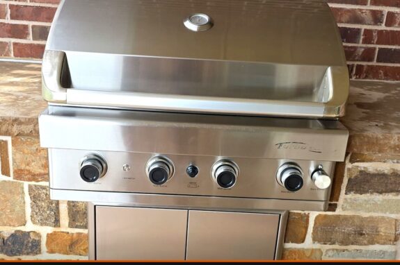Built-in outdoor grill firebox after professional deep cleaning