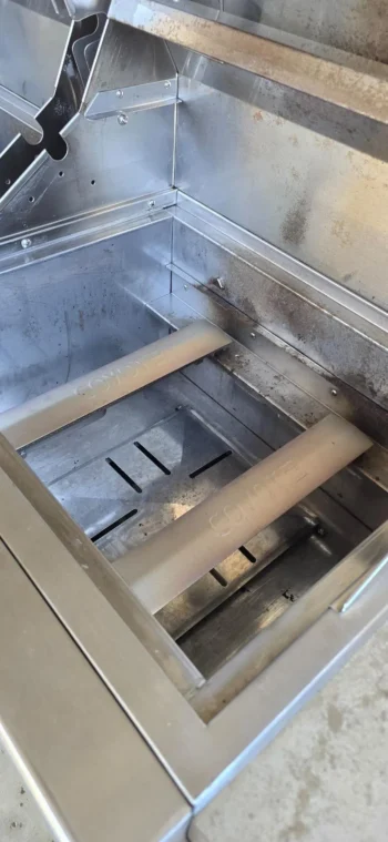 Grill burners and heat plates cleaned and reinstalled after degreasing
